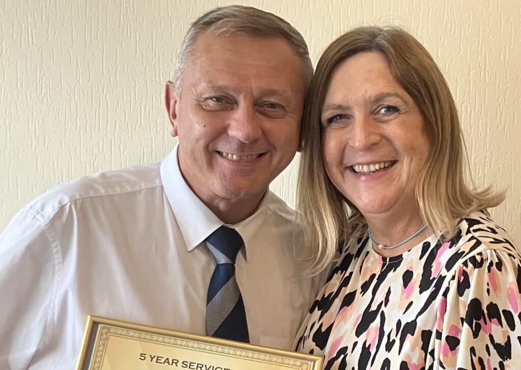 Ruth Meadows, Divisional Operations Manager, presents a Five Year Long Service Award to Martin Griffiths, Funeral Manager for Chester and Crewe, recognising his dedication and contribution to Funeral Partners.
